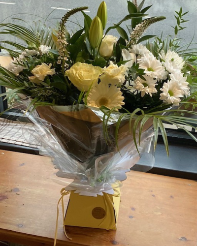 White Christmas - A hand tied bouquet of whites & greens beautifully wrapped & presented in a gift box of water.