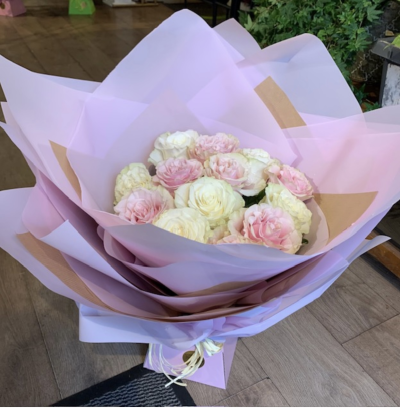 Lux 12 Rose bouquet - A luxury hand tied bouquet of 12 long stem, ivory and blush pink roses. Presented in dramatic blush pink wraps and a blush box.