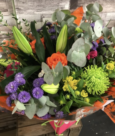 Mother’s Day Vibrant bouquet - A hand tied bouquet in bright vibrant shades. Gift wrapped and presented in a box of water. Available in 4 sizes. A perfect Mother’s Day gift.